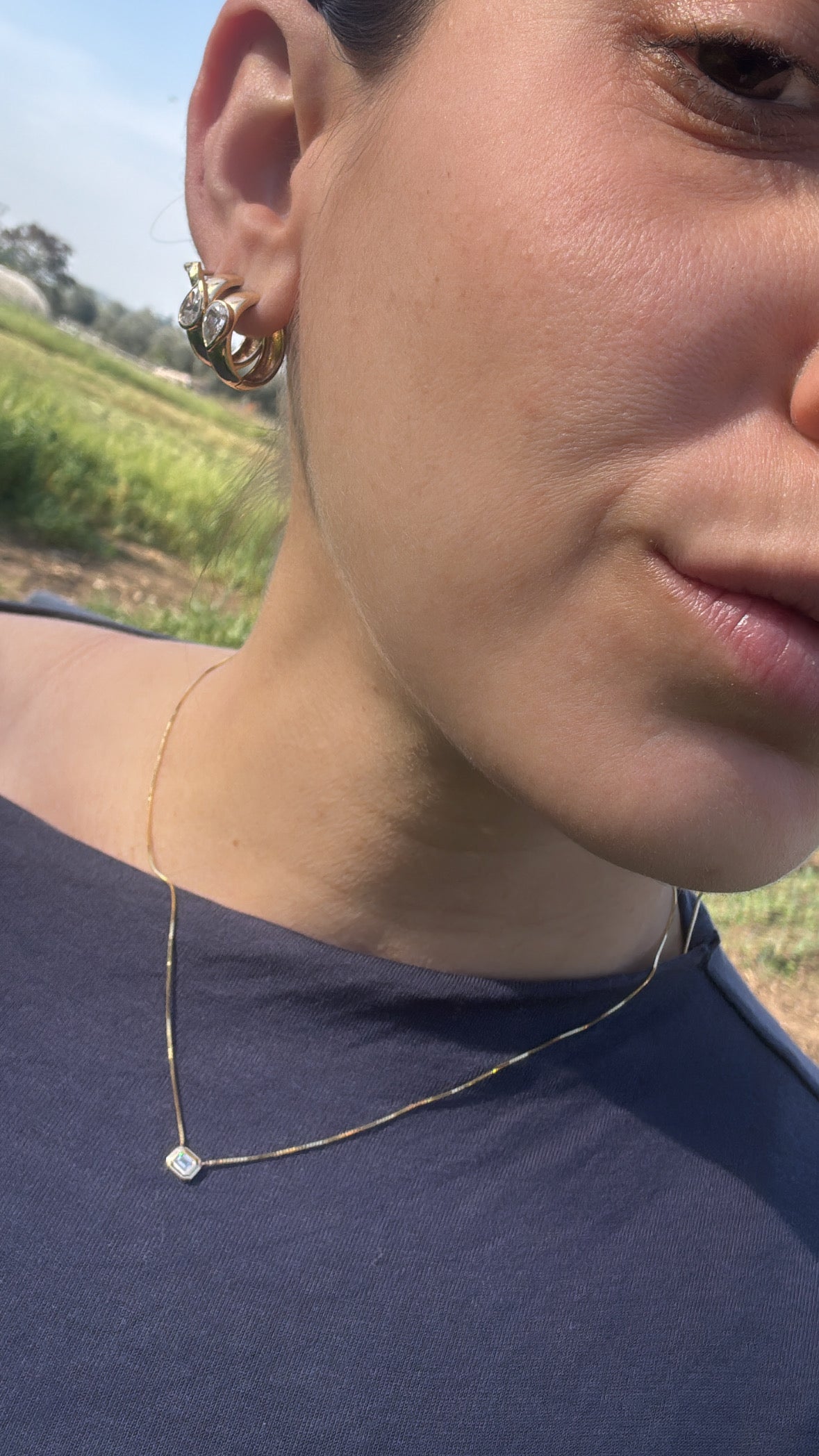 Horizontal Emerald cut diamond necklace