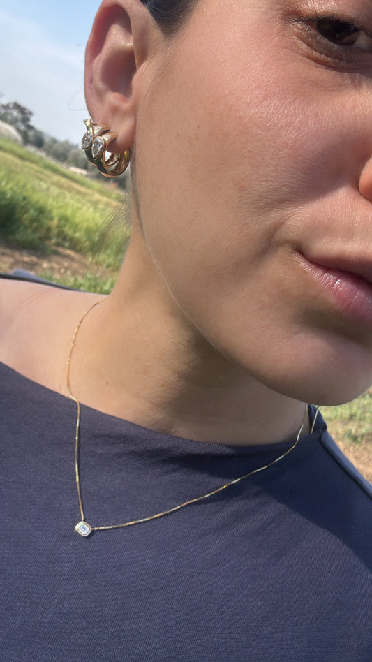 Horizontal Emerald cut diamond necklace